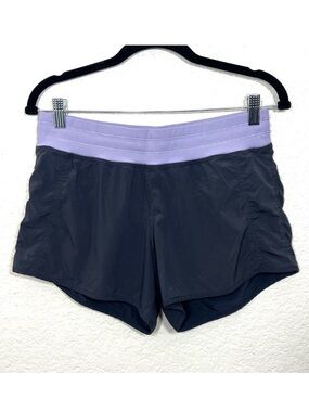 Lululemon Run Free & Crosstrain Short
Coal Gray and Lilac Purple Size 8